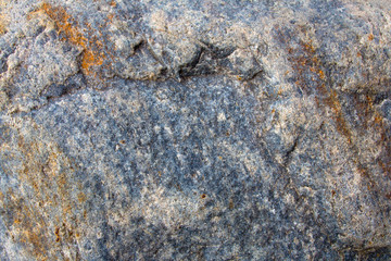 Rough outdoor stone wall background