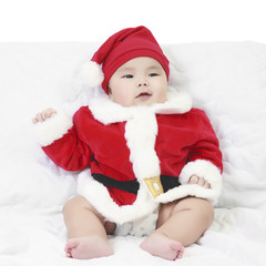 cheerful children or babies with santa claus suit for christmas or happy new year party day