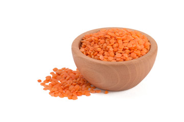 Red lentil in a wooden bowl