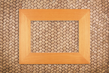 modern picture frame on rattan wall