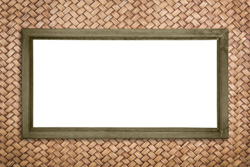 wide picture frame on rattan wall, isolated