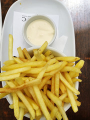Bowl Of Hot Chips On A White Plate