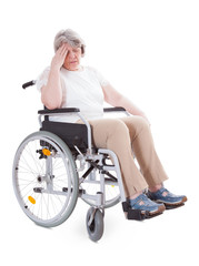 Naklejka na ściany i meble Invalid senior sitting in wheelchair