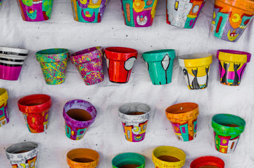 Colorful painted plant pots at a weekend fair in San Telmo neighborhood, Buenos Aires