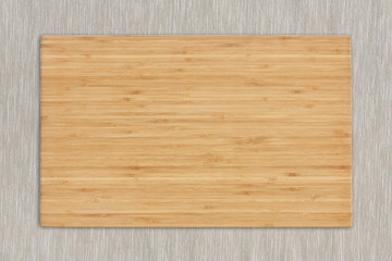 blank block or wooden cutting board for food preparation on tabl
