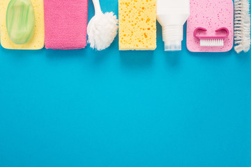 Set of cleaning tools on a blue background
