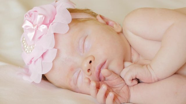 Little girl sleeping newborn