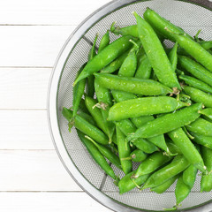 Green peas in colander