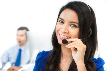 Asian businesswoman working as an operator in call center