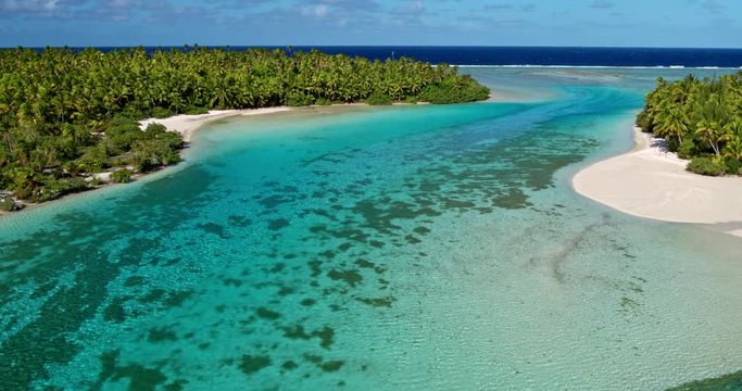 Aerial view of beautiful tropical island lagoon and white sand beach in the South Pacific