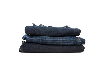 Stack of dark blue jeans