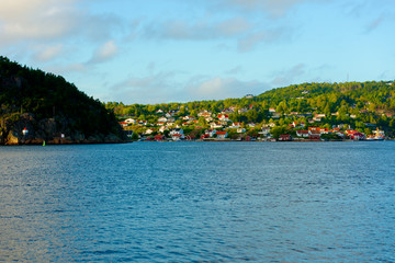 The Norwegian town of Sponvika as seen in late afternoon from the Swedish side of the fiord.