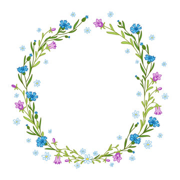 Floral wreath composition with cornflowers, chamomiles and bluebells