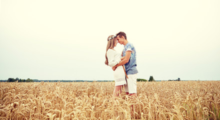 happy smiling young hippie couple outdoors