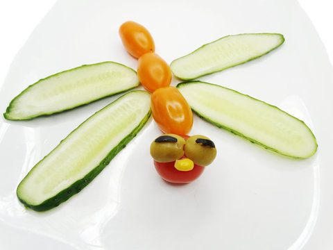 creative vegetable food snack with tomato