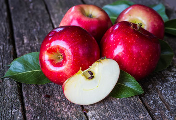 Red apples in wooden box. Copyspace