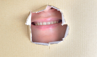 smile behind in a box