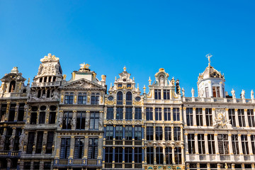 Fototapeta na wymiar The Grand Place is the central square of Brussels. It is surrounded by opulent guildhalls and two larger edifices, the city's Town Hall, and the Breadhouse