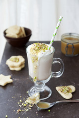 Hot cocoa with caramel topping and pistachios