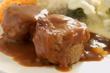 Faggots a traditional British meat loaf in gravy