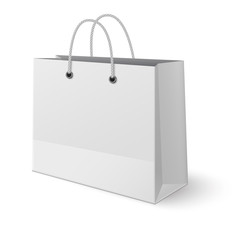 White paper classic shopping bag isolated on white background