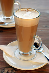 Latte Coffees in tall glasses with table settings
