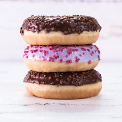 Donut. Sweet icing sugar food. Dessert colorful snack. Glazed sprinkles.