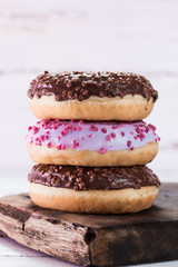 Donut. Sweet icing sugar food. Dessert colorful snack. Glazed sprinkles.