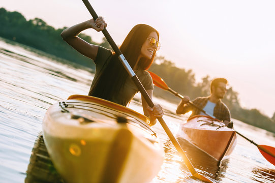 Kayaking on river. 