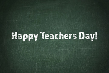Obraz premium Teachers day concept. Text on chalkboard