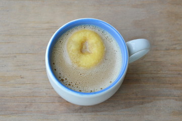 mini donuts floating in coffee