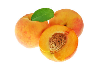 Fresh peaches on a white background
