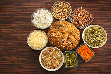 Food high in protein on wooden background