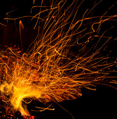 fire with sparks on a black background