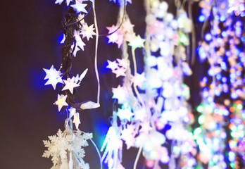 Bright Christmas garland on dark background