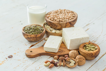Selection vegan protein sources on wood background