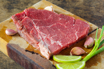 Slide top round beef preparation for cooking