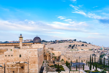 Fototapeta premium Dung gate of the old city and Al-Aqsa Mosque against the background of Jewish cemetery. Judaism. Jerusalem, Israel.