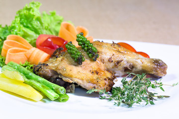 Grilled Chicken steak with sweet sauce, In white dish on the bro