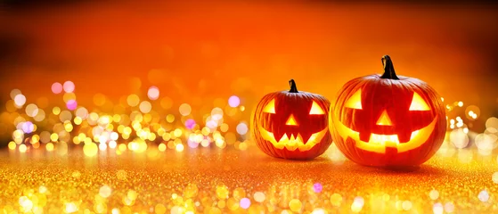 Deurstickers Halloween Pumpkin With Lights And Sparkle Bokeh Background   © Romolo Tavani
