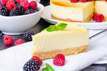 Delicious cheesecake with raspberries and blackberries