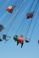 Mother and Son Swing Ride Fair Blue Sky Festival Swinging