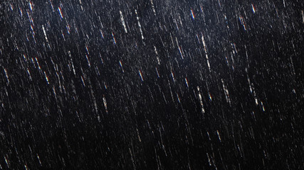 Falling raindrops footage animation in slow motion on dark black background with fog, lightened from top, rain animation with start and end, perfect for film, digital composition, projection mapping - obrazy, fototapety, plakaty