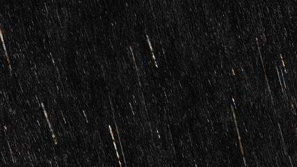 Falling raindrops footage animation in slow motion on black background, black and white luminance...
