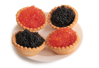 Fish caviar in a plate on a white background