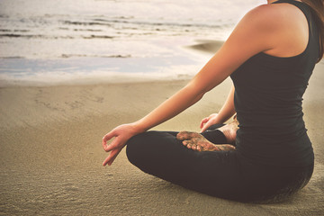 Woman practicing yoga in various poses (asana)