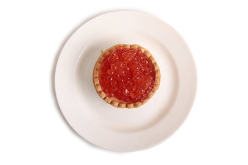 Fish caviar in a plate on a white background