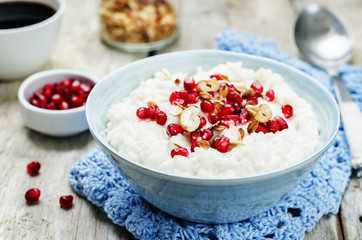 Coconut rice with pomegranate and granola