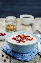 Coconut rice with pomegranate and granola
