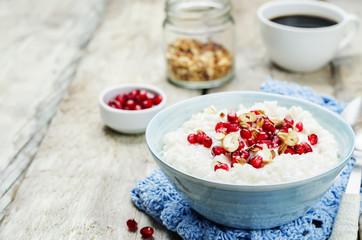Coconut rice with pomegranate and granola